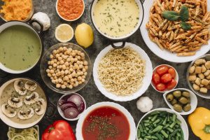 top view dishes with noodles tomato soup